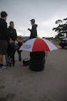 Protecting the tires from the rain with a Hi-Tec Oils umbrella